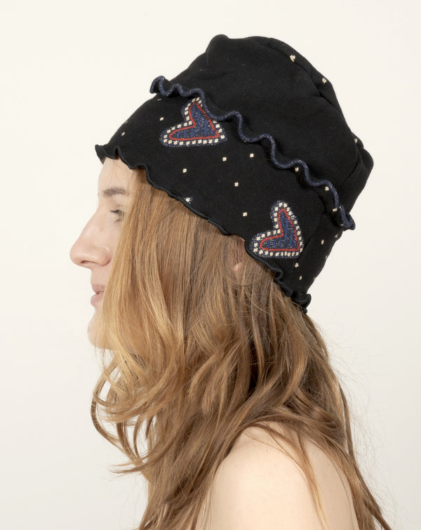 bonnet berthe aux grands pieds noir femmes